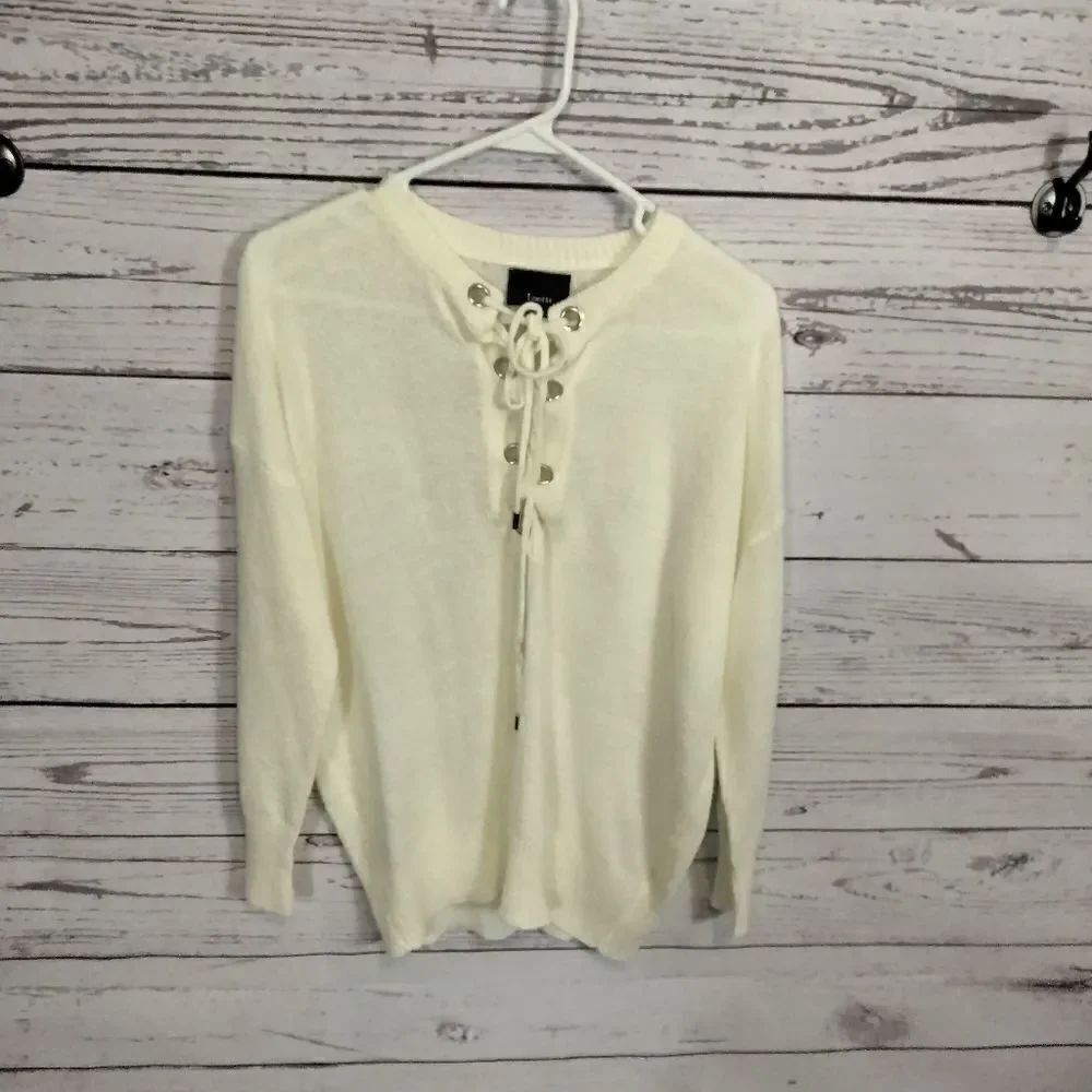 'Lumiere's" woman's sweater, shirt.